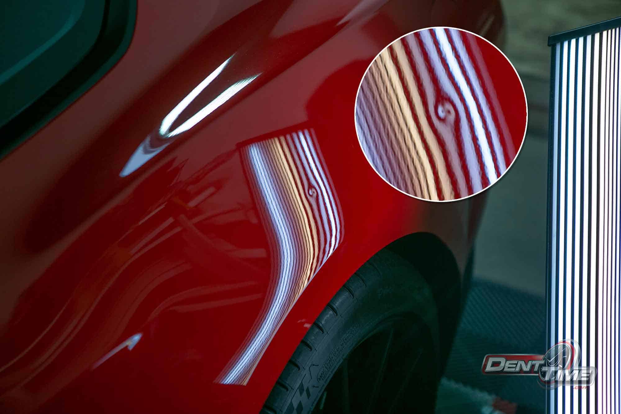 Dent bending the reflection-board lines before paintless dent repair in San Diego