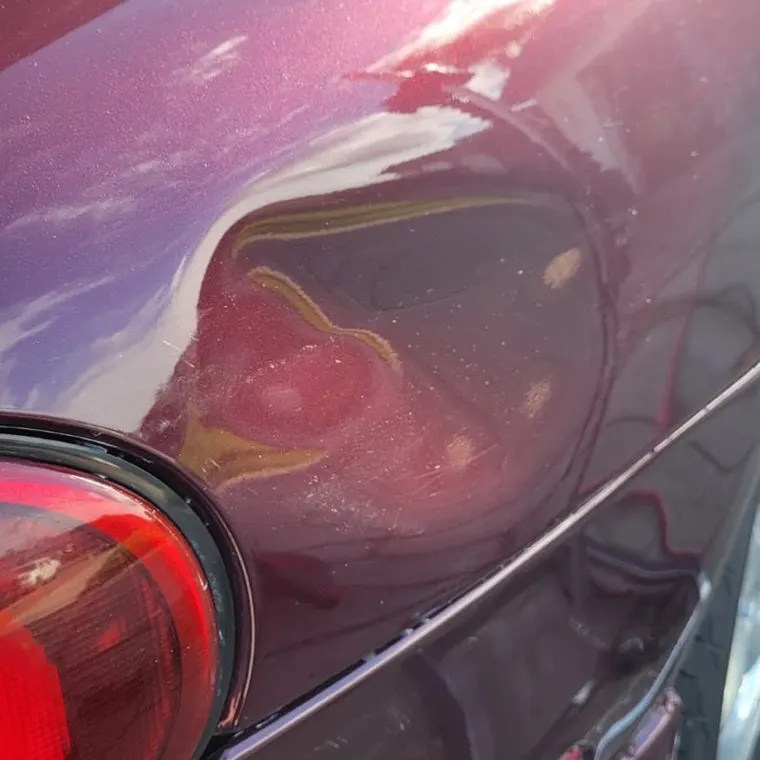 Large or Complex Dent paintless dent repair example, priced $500 to $4000