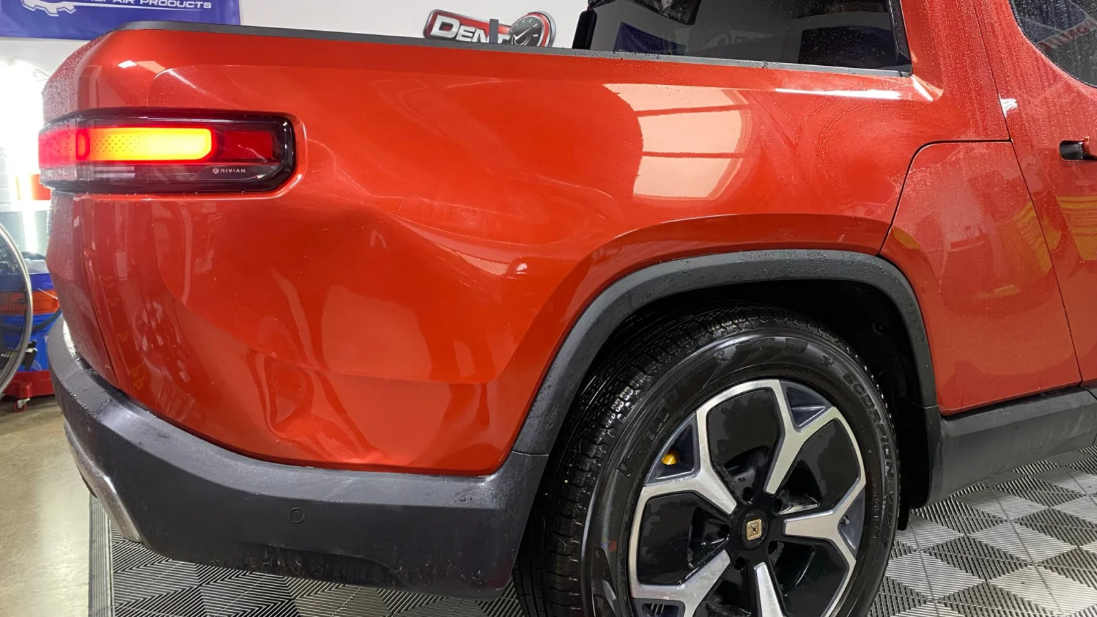 Rivian panel after paintless dent repair in Laguna Niguel, back to factory