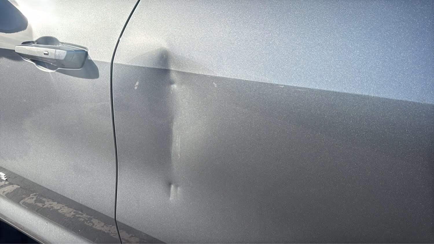 Chevy Traverse driver door before repair