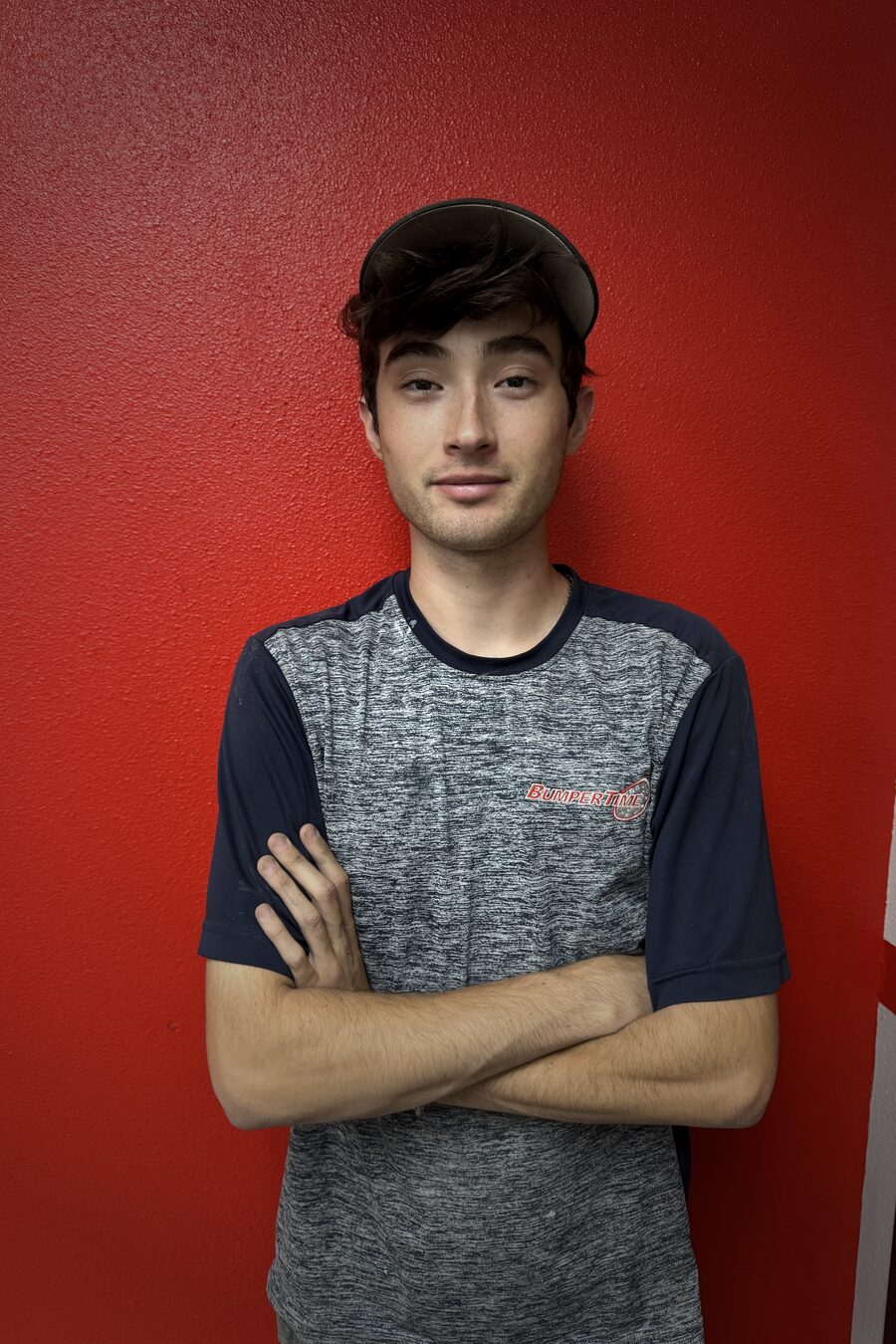 Homero, bumper and scratch repair technician at Dent Time, in a Bumper Time shirt