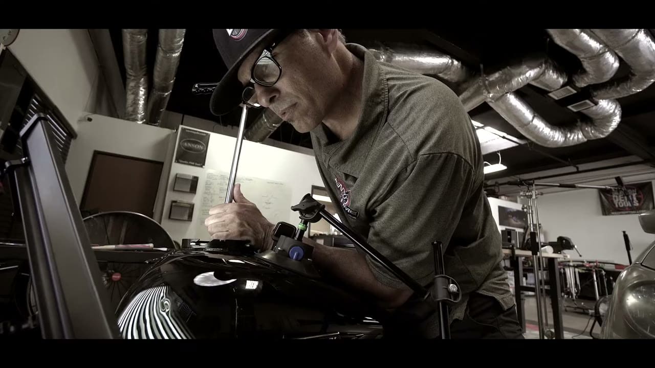 Harley-Davidson gas tank dent repair in progress at Dent Time