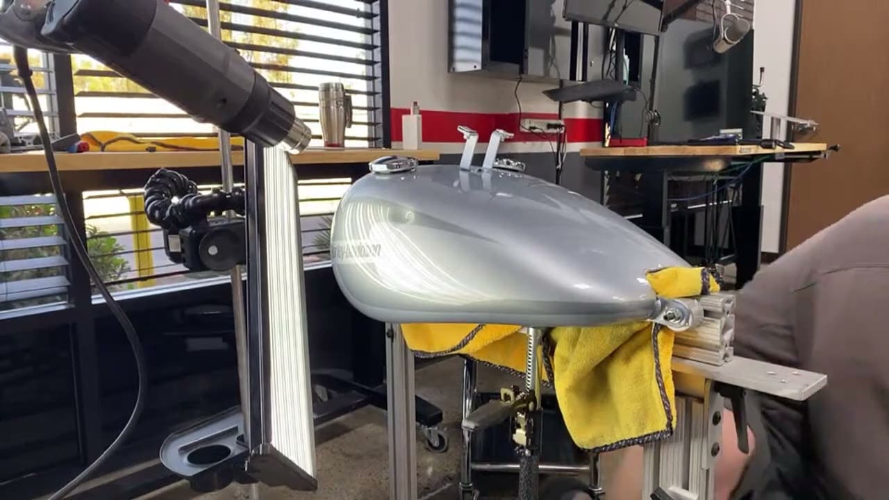 Harley tank dent removal demonstration showing the tool reaching the back of the tank