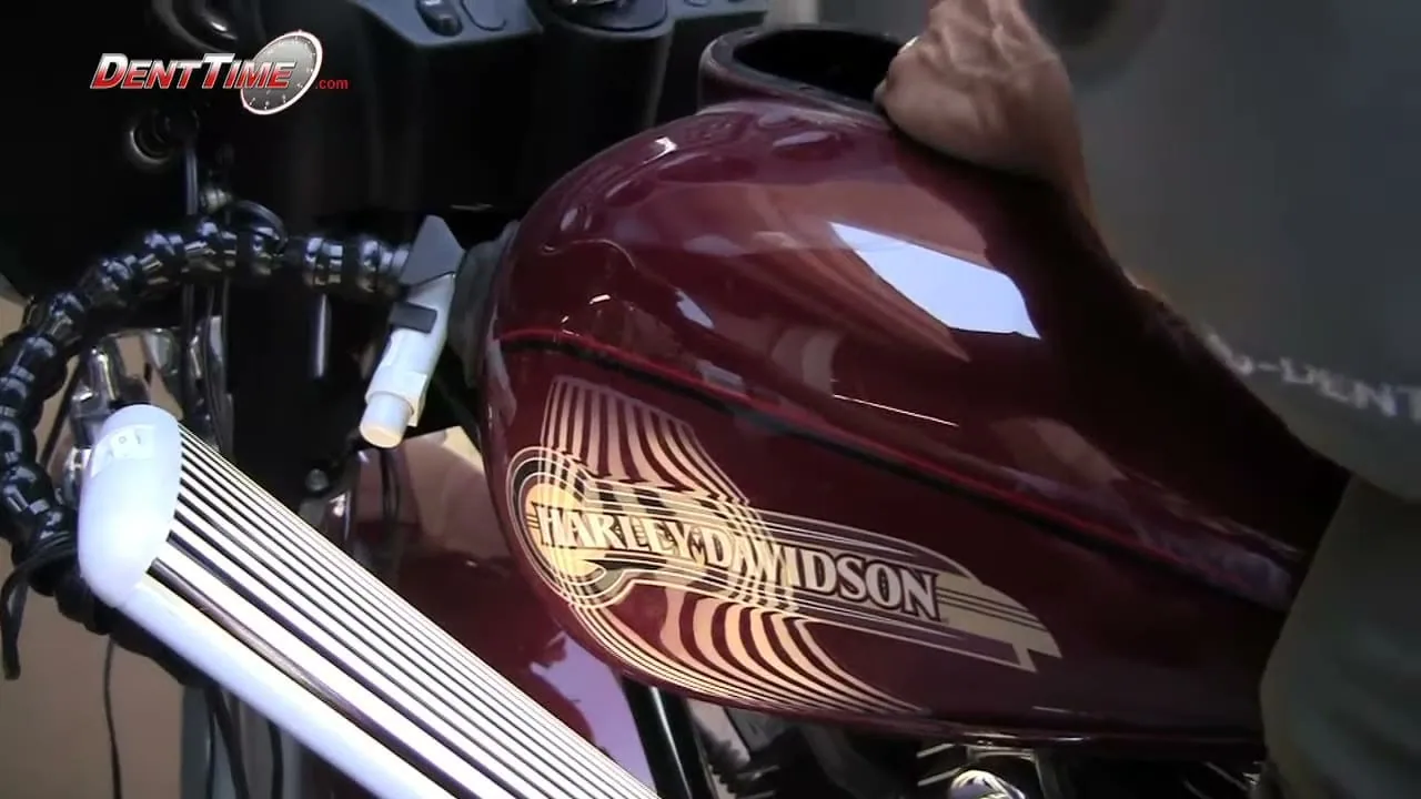 San Diego motorcycle paintless dent repair on a gas tank