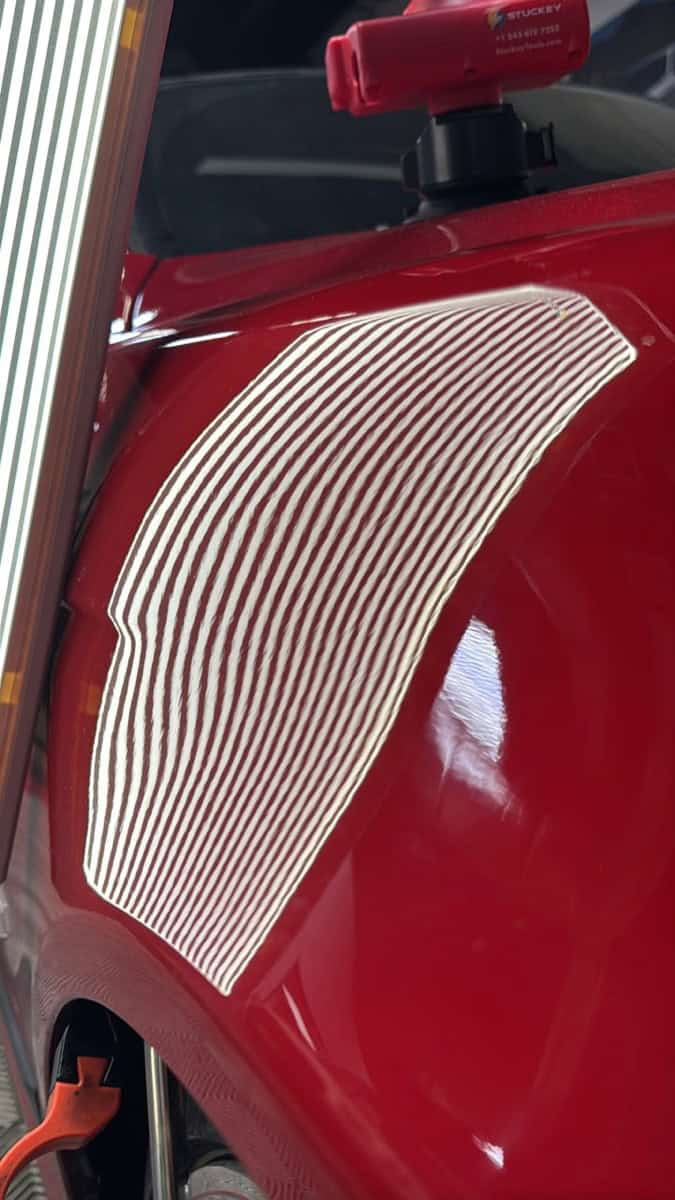 BMW M5 fender after PDR repair complete