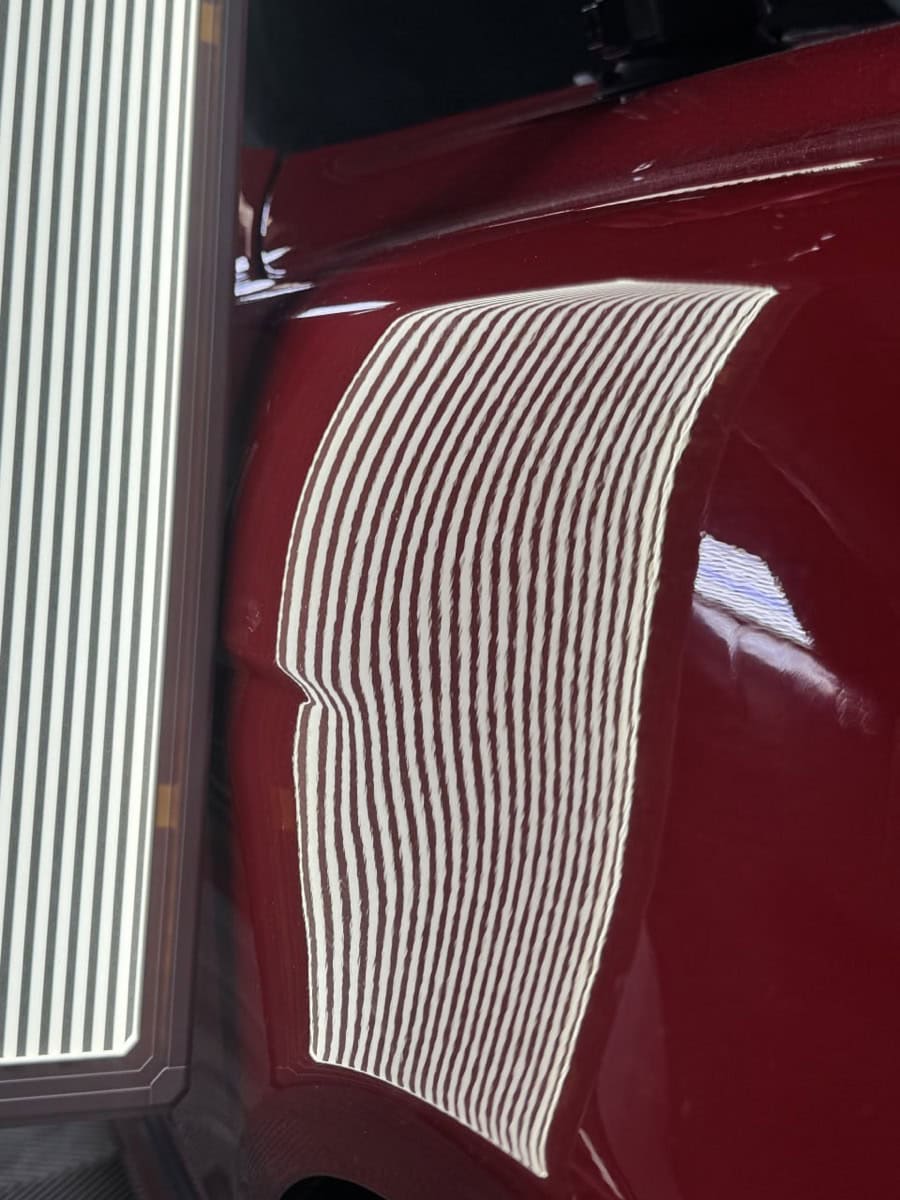 BMW M5 fender after paintless dent repair in San Diego