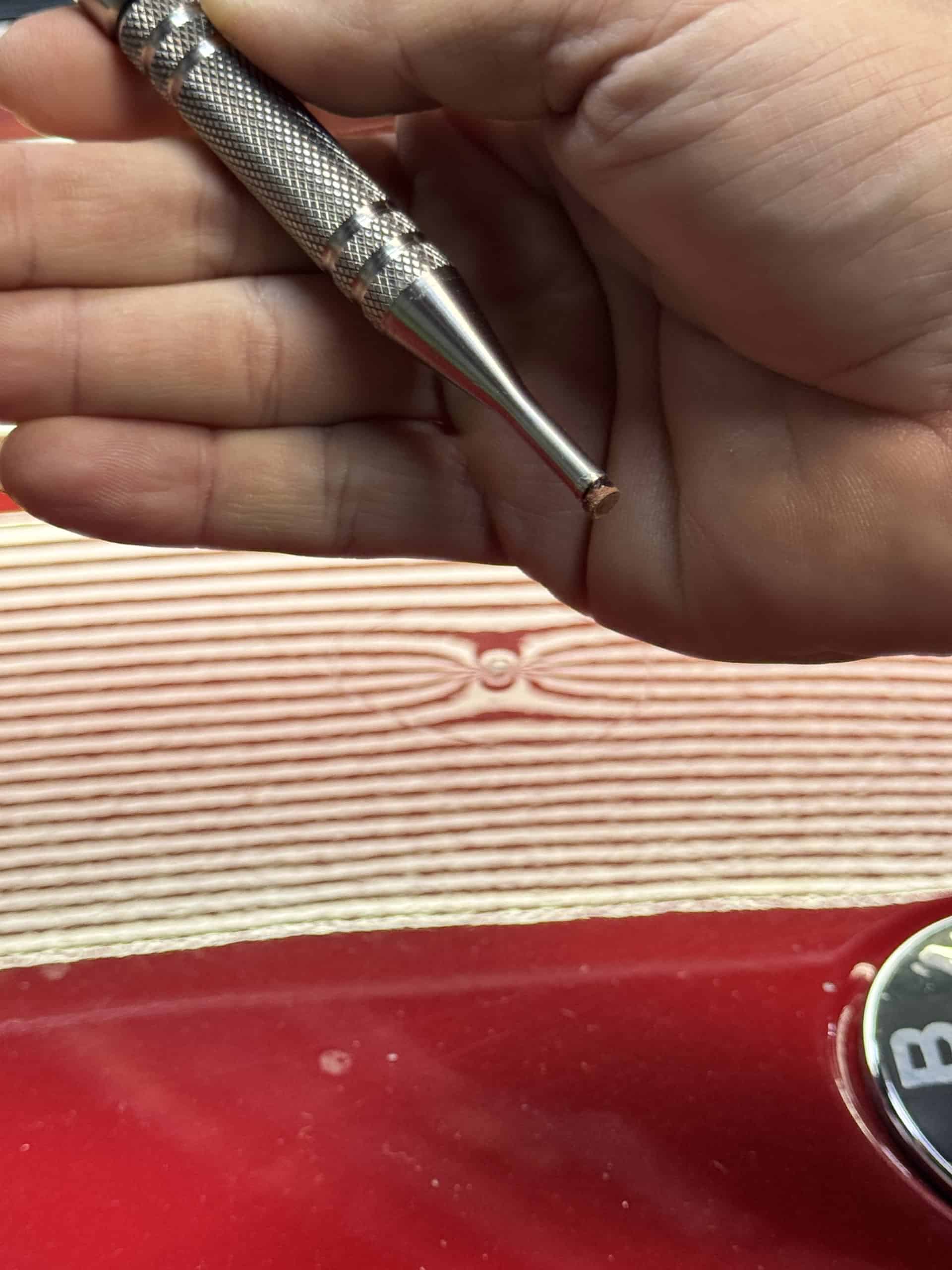 Paintless dent repair BMW San Diego - tape application on damage