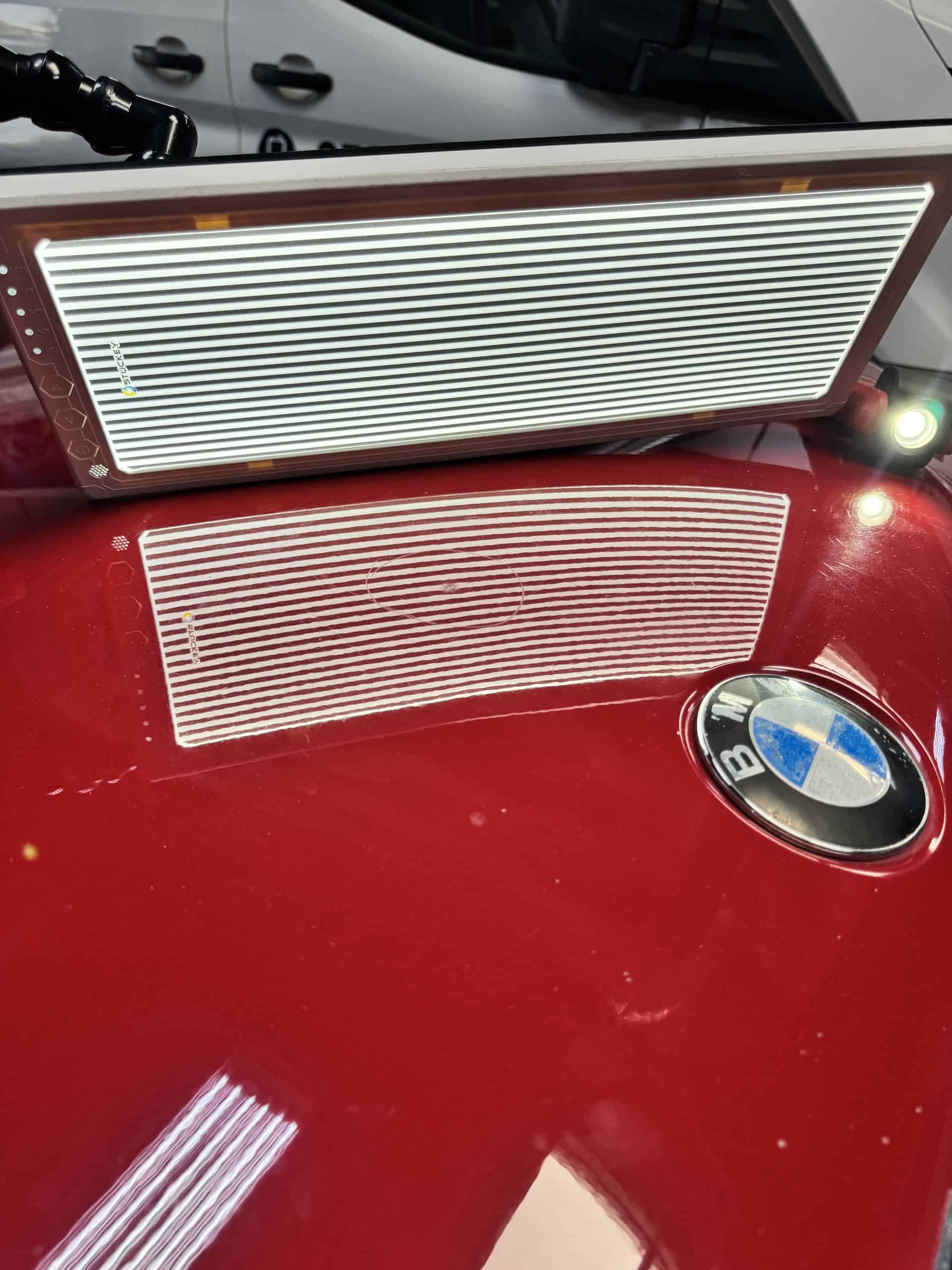 BMW dent repair San Diego - flat reflection achieved